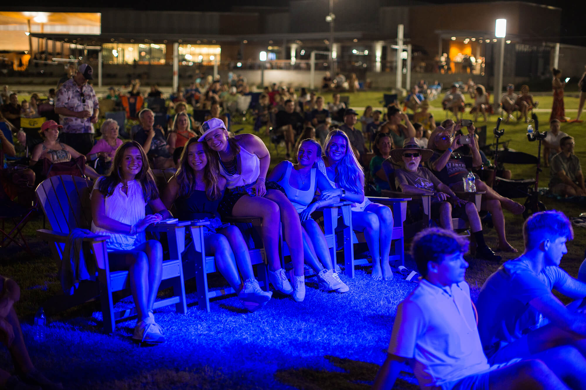 Young adults enjoying live music at Montgomery Whitewater in Montgomery, Alabama